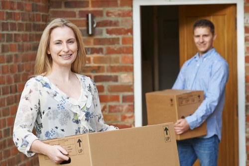 Loading boxes and household items into a van in Fulham