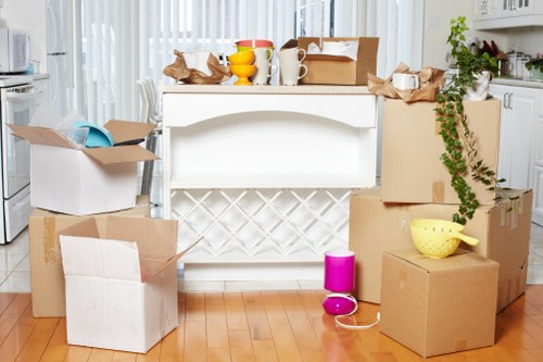 Packed boxes and furniture ready for a home move in Fulham