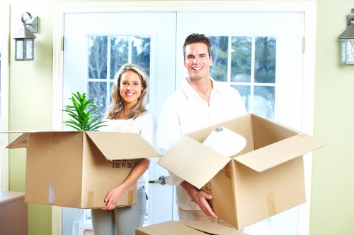Local removals team loading boxes for a move near Fulham