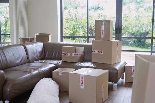 Prepared boxes and furniture ready for a removals van in Fulham